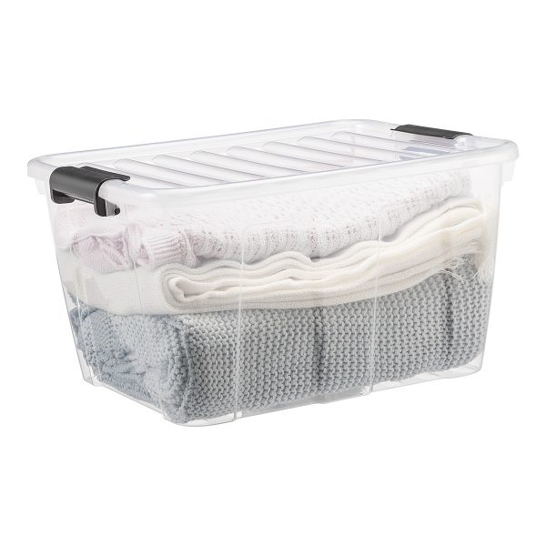 Home Box 30L storage box with a clear design. Blankets and clothes are stored inside the box. The container has firm closing clips.