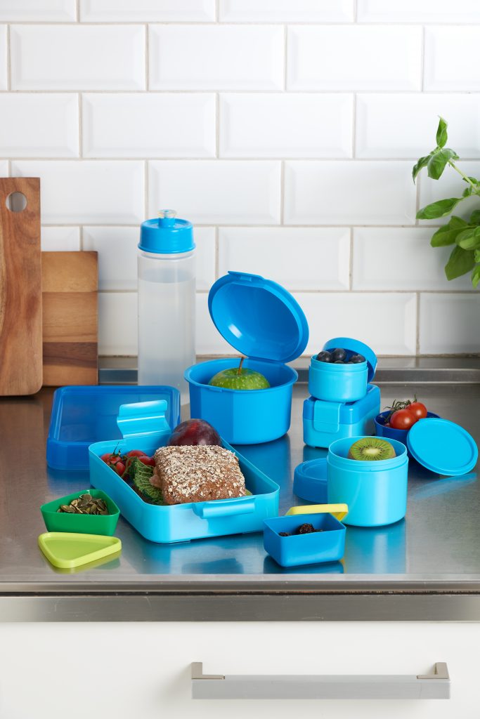 Hilo, series of lunch boxes in various shapes and sizes is suitable for bigger meals as well as smaller snacks. Blue variant of series stands on the tabletop.